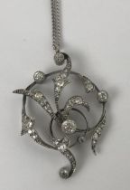 An Edwardian style diamond pendant, on an 18ct gold chain 40 mm x 28 mm weight: 7.1 g all in