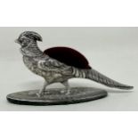 An Edward VII silver novelty silver pin cushion, in the form of a pheasant, by H V Pithney & Co,