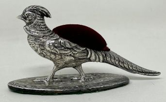 An Edward VII silver novelty silver pin cushion, in the form of a pheasant, by H V Pithney & Co,