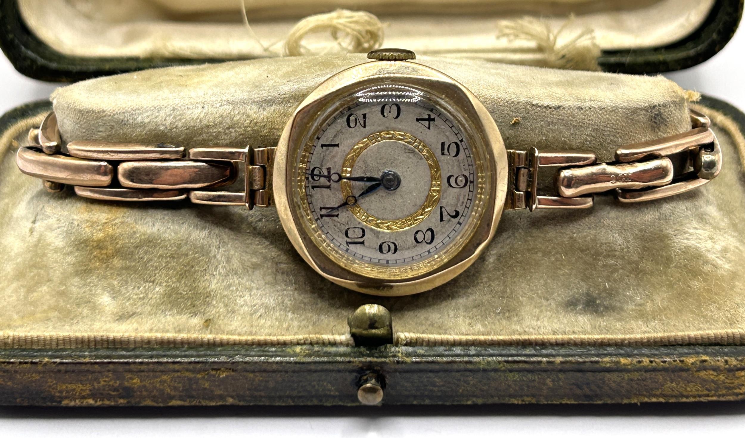 A ladies yellow coloured metal wristwatch, on a silk strap, with a worn vintage watch box, and a - Image 4 of 6