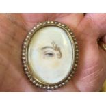 A lover's eye brooch, in a yellow coloured metal and seed pearl mount, 4 x 3 cm Ivory Exemption