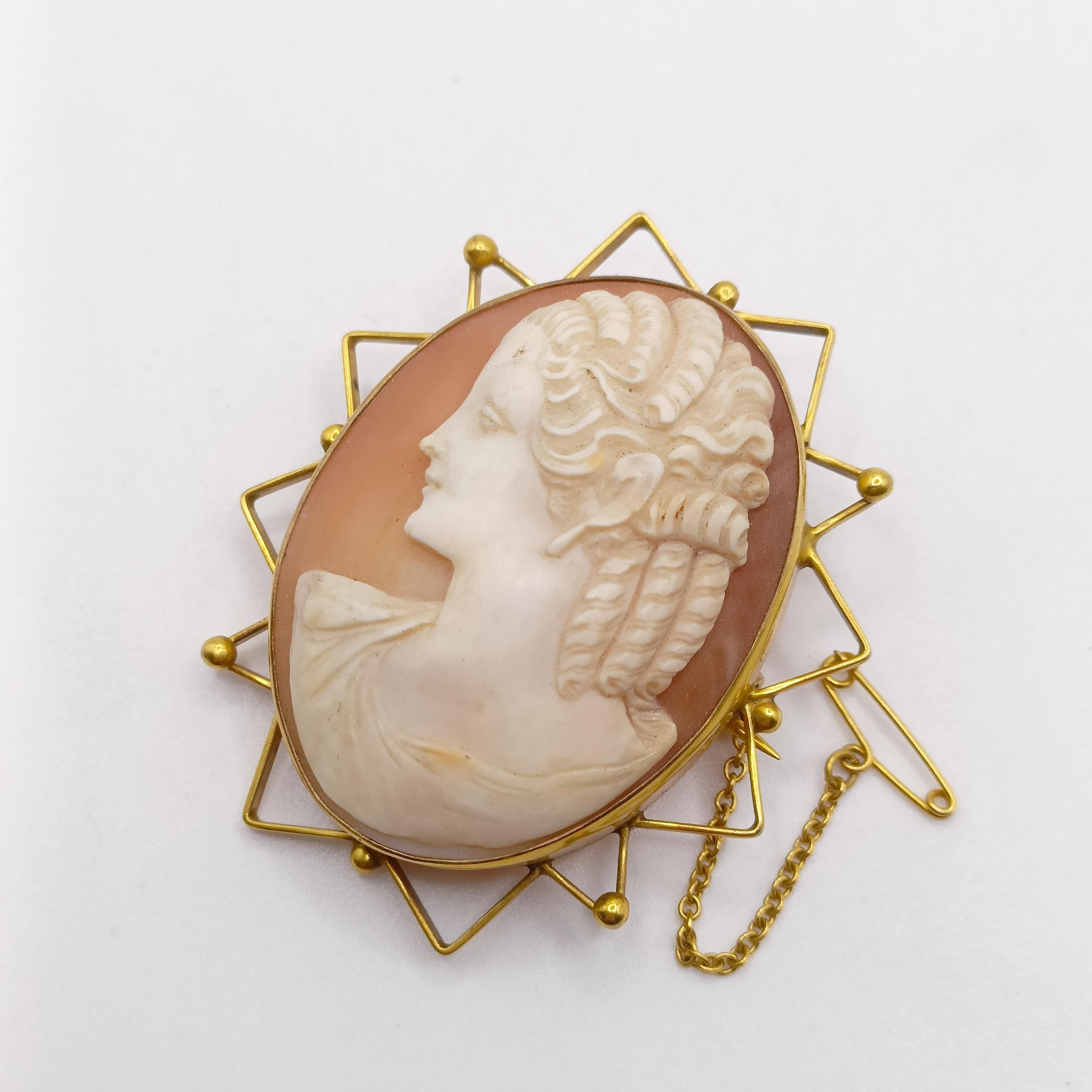 A silver gilt filligree cameo clip-on earing, a cameo brooch, a metal ring and a silver coloured - Image 7 of 10