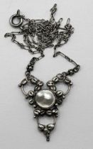 An Arts and Crafts silver coloured metal and shell necklace, by Jean Bassett Provenance:  Descent