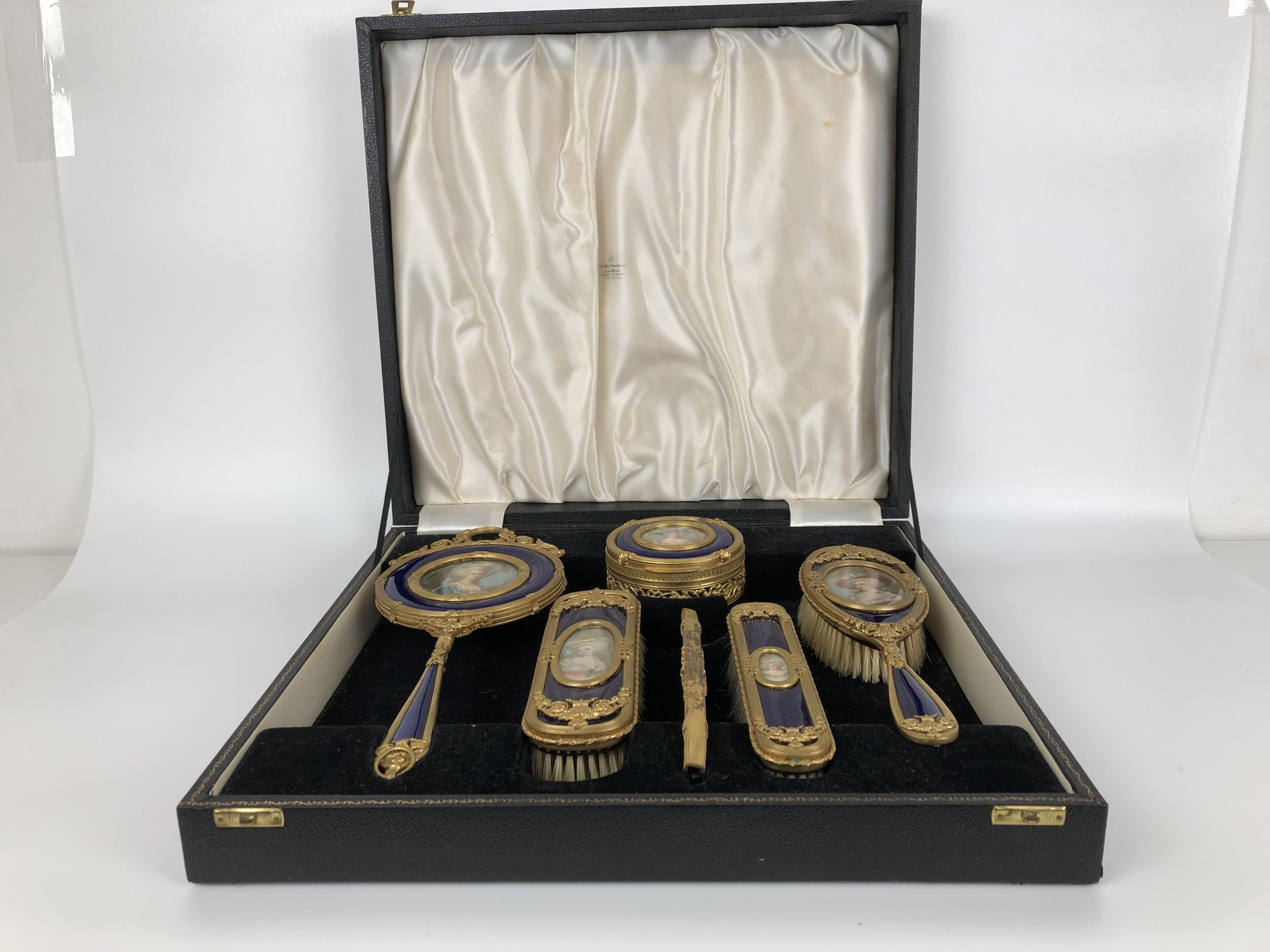 An impressive early 20th century gilt metal and blue enamel dressing table set, inset with - Image 6 of 10