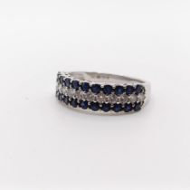 An 18ct white gold, diamond and sapphire ring, ring size L 1/2