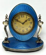 A George V silver and blue enamel bedside clock, Birmingham 1928 clock winds and ticks, but we do