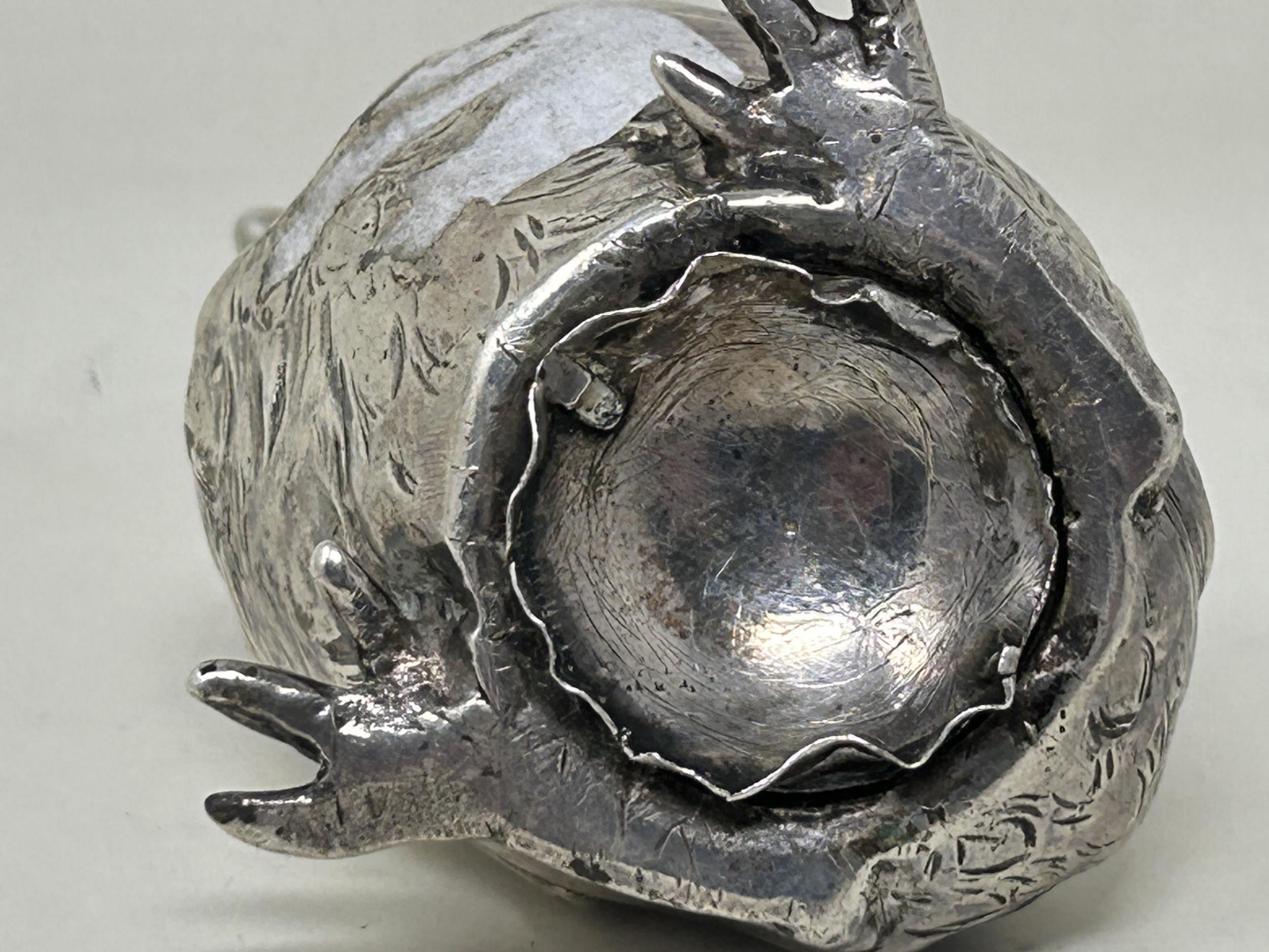 A novelty Continental silver coloured metal pepper, in the form of a chick, import marks for - Image 5 of 5