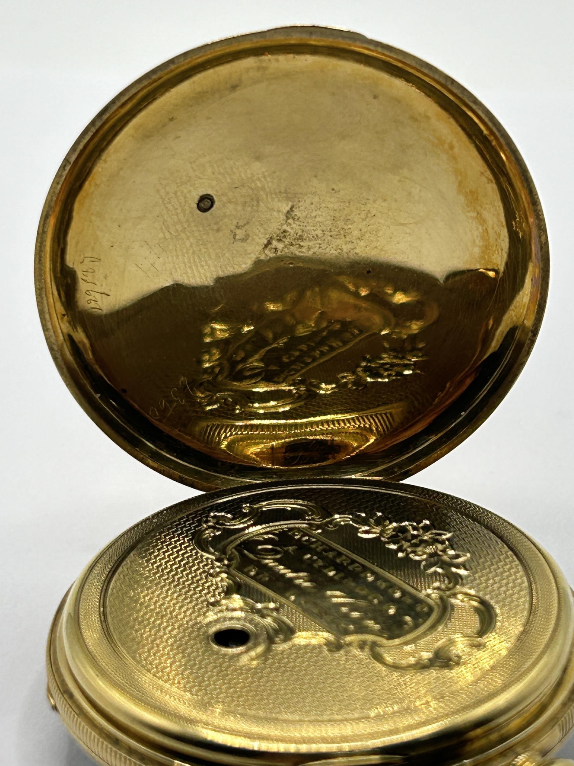An 18ct gold open face pocket watch, the enamel dial with Roman numerals, the dust cap with engraved - Image 5 of 5