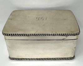 A George V silver biscuit box, with lions mask ring handles, Sheffield 1924, 28.1 ozt Height: 8.5 cm