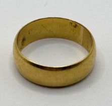 A 22ct gold wedding band, ring size N, 5.5 g