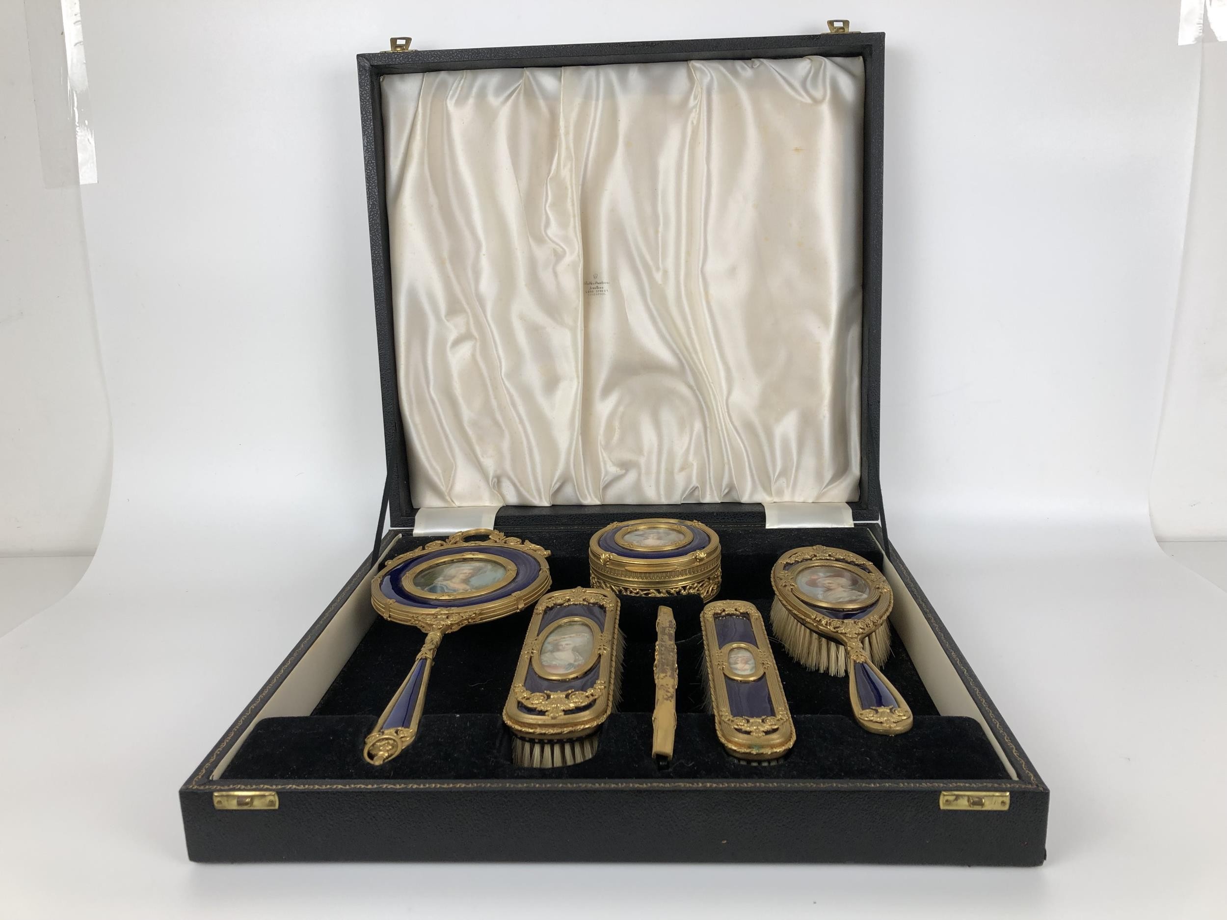 An impressive early 20th century gilt metal and blue enamel dressing table set, inset with - Image 7 of 10