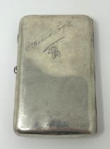 A Continental silver coloured metal cigar case All in 6.1 ozt