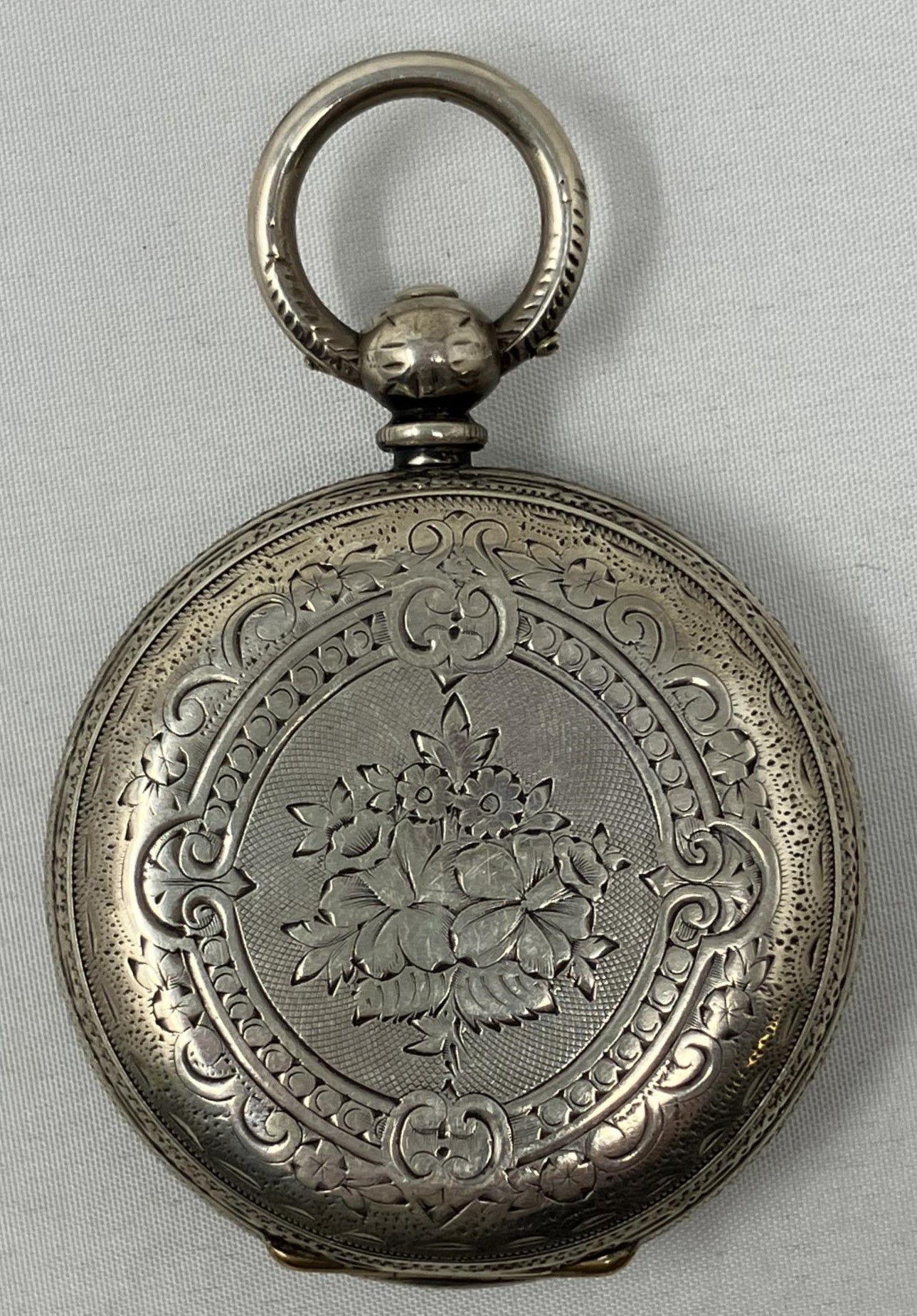 A Continental silver coloured metal fob watch, and a compact (2) - Image 2 of 4