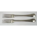 A pair of George I silver Old English pattern three pronged forks, London 1724, 3.6 ozt