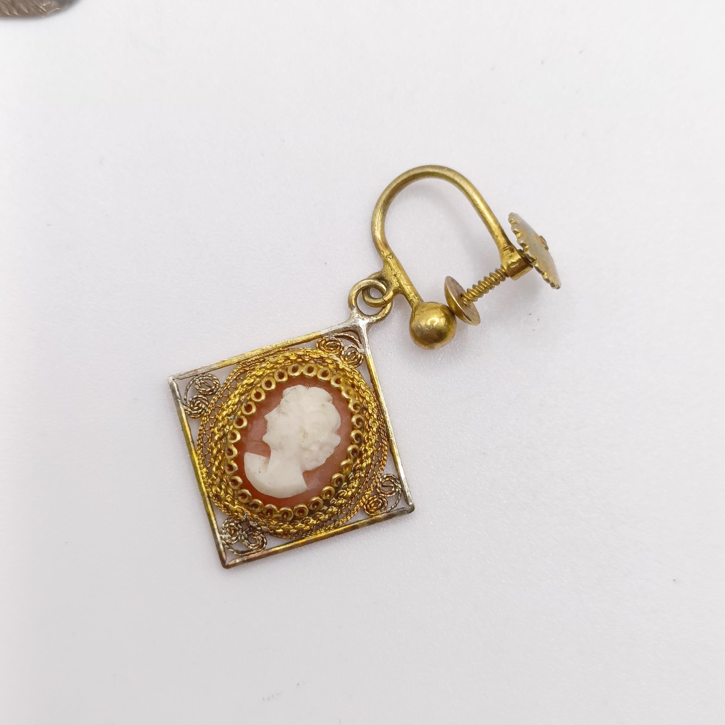 A silver gilt filligree cameo clip-on earing, a cameo brooch, a metal ring and a silver coloured - Image 2 of 10