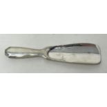 A Tiffany & Co sterling silver shoe horn, handle filled, all in 60 g