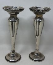 A pair of George V silver spill vases, Sheffield 1919, bases filled, all in 4.76 ozt