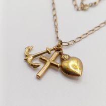 A 9ct gold heart shaped pendant, an anchor and a cross, all on a chain, 3.2 g