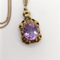 An amethyst pendant, on a 8ct gold chain Chain length 44 cm