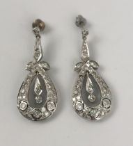 A pair of Edwardian style diamond drop earrings, in a vintage jewellery box