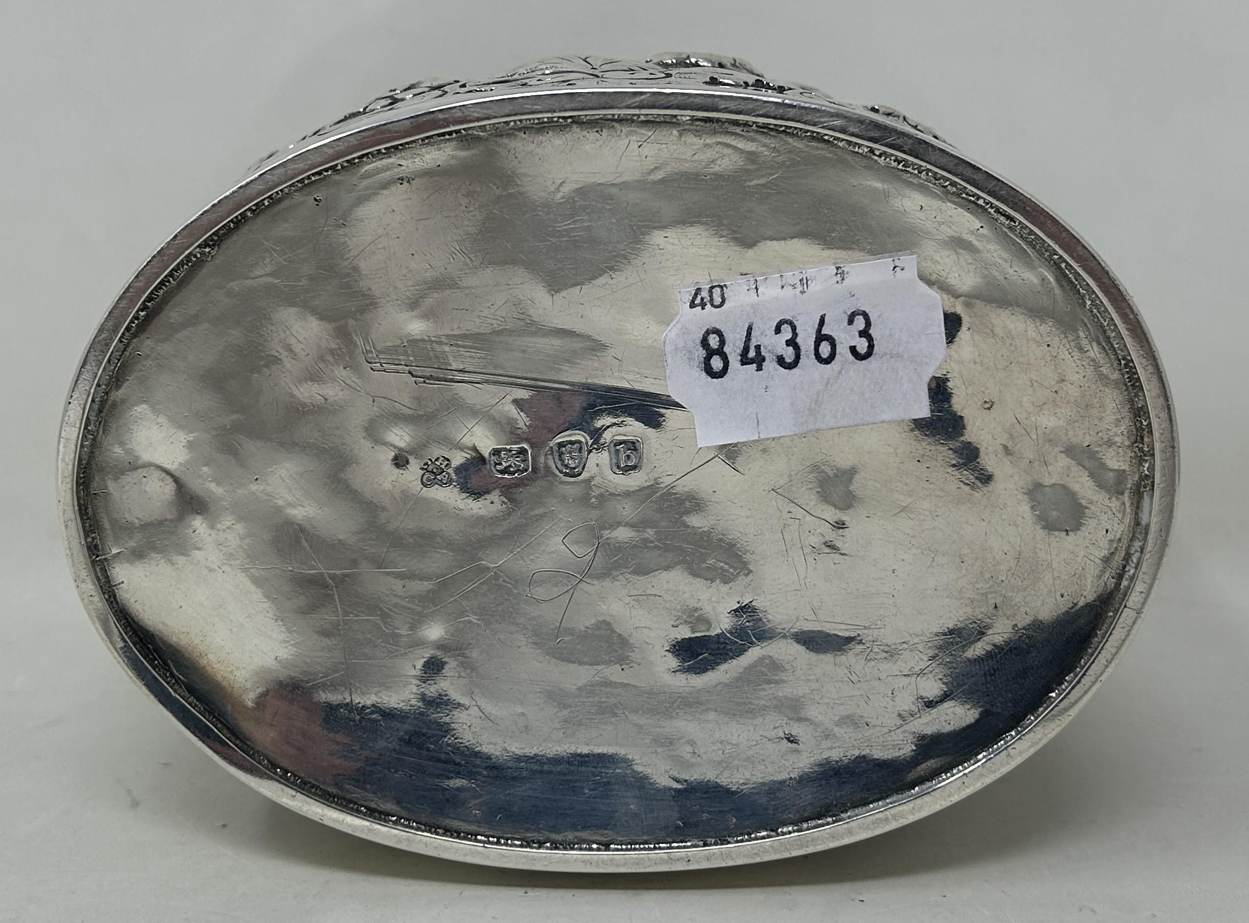 A George III silver oval caddy, London 1777, 13.1 ozt decoration probably later - Image 7 of 8