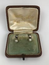 A pair of pearl earrings, in a vintage case weight: 1.3 g all in length: 12.8 mm approx.