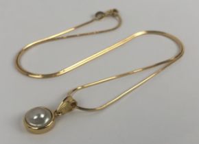 An 18ct gold and pearl pendant, on a chain Overall length, including clasp: 42 cm