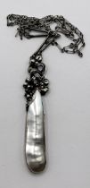 An Arts and Crafts silver coloured metal and shell necklace, by Jean Bassett Provenance:  Descent