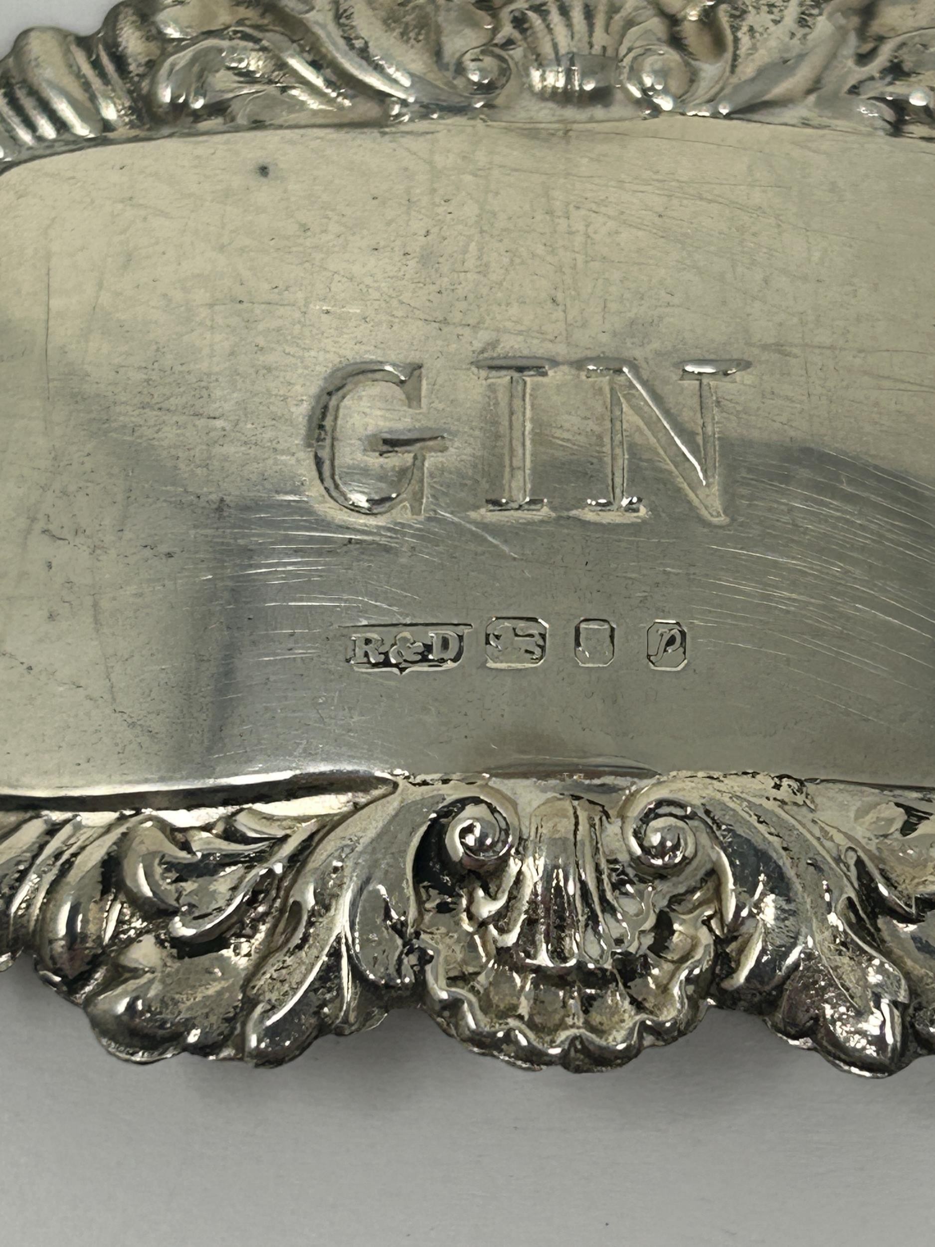 A set of four Elizabeth II silver spirit labels, Port, Gin, Sherry and Scotch, London 1970, and a - Image 3 of 7