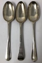 A pair of Victorian silver Hanoverian or rat tail table spoons, London 1898, and another similar,