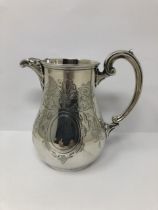 A Victorian silver cream jug, by Charles Stuart Harris, London 1869, 8.7 ozt