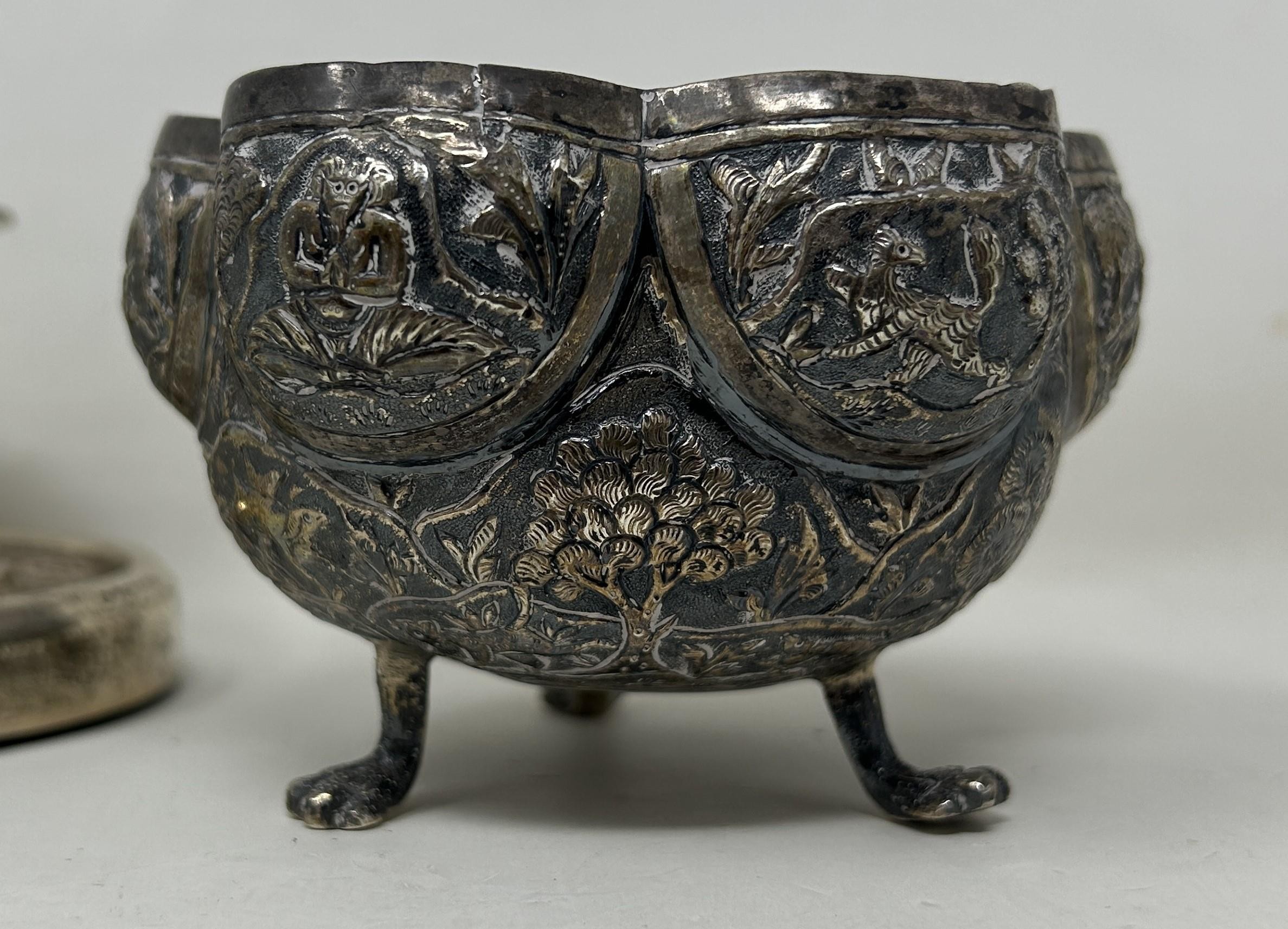 An Indian silver coloured metal sugar bowl, assorted teaspoons, a napkin ring, a pair of pierced - Image 5 of 5