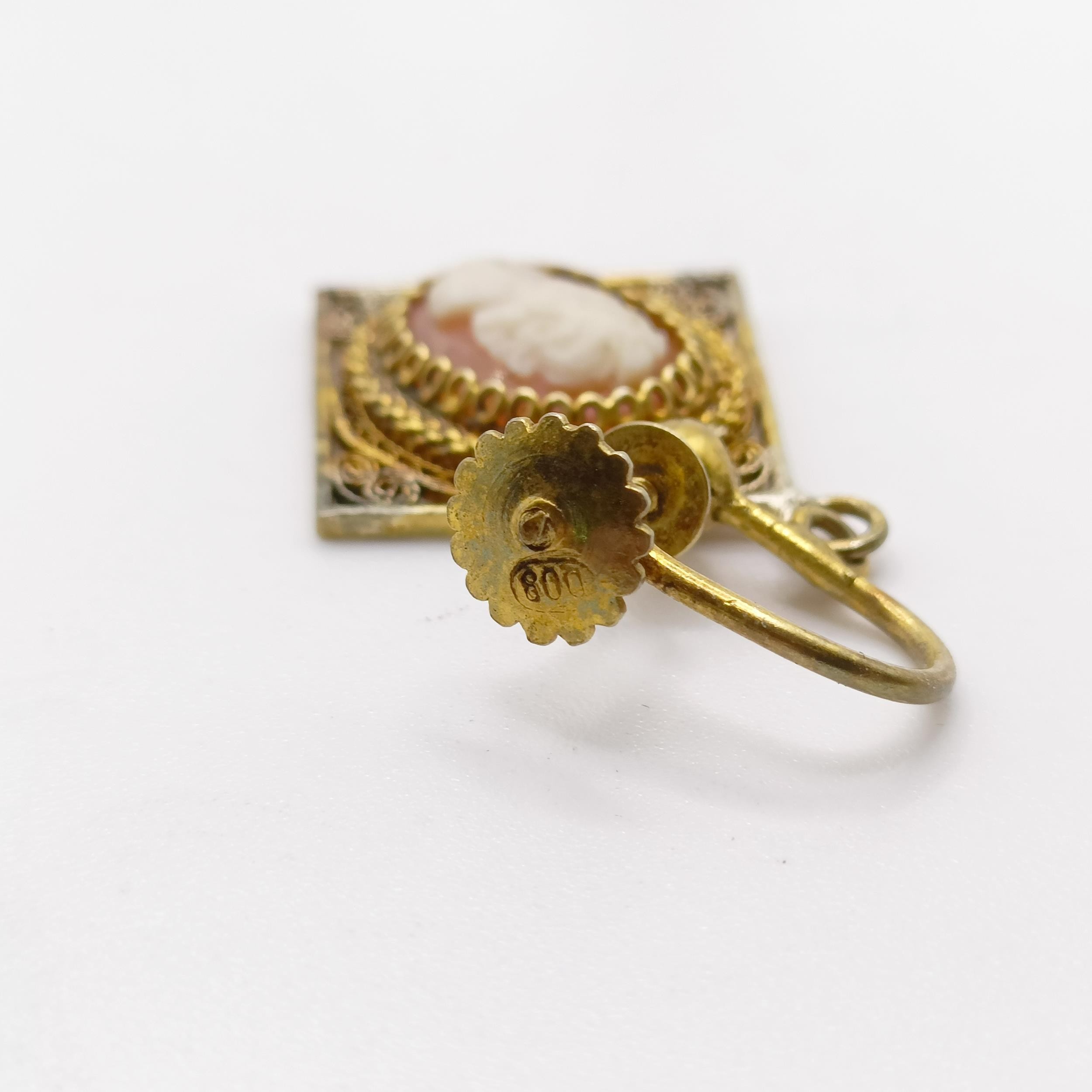 A silver gilt filligree cameo clip-on earing, a cameo brooch, a metal ring and a silver coloured - Image 4 of 10