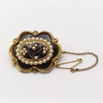 A 19th century yellow coloured metal and seed pearl memorial brooch, engraved Richard Brimton,