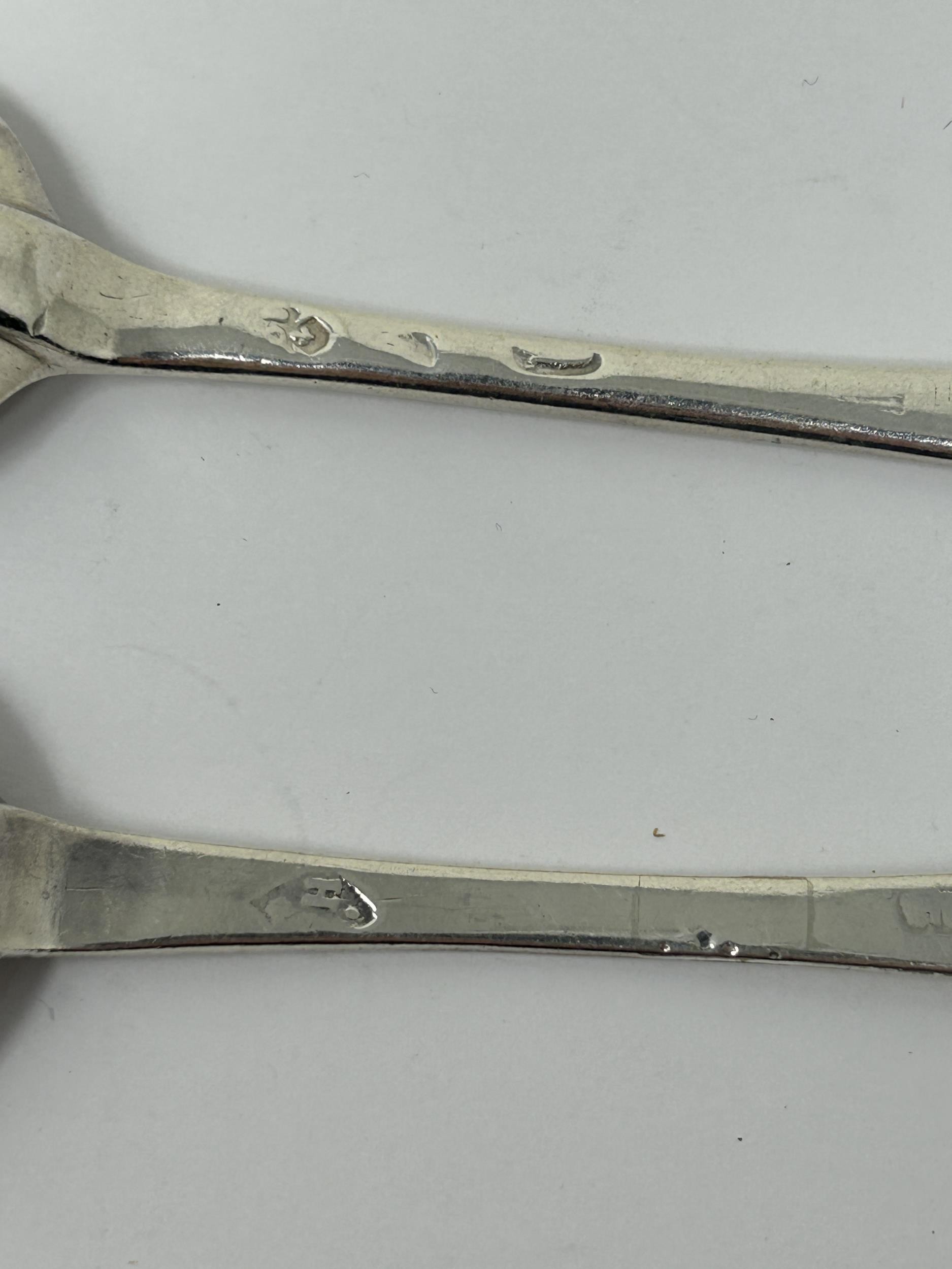 Two matching 18th century silver trefid rat tail spoons, marks rubbed, 1.2 ozt some repairs - Image 4 of 5