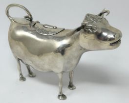 A Continental silver coloured metal novelty creamer, in the form of a cow 5 ozt