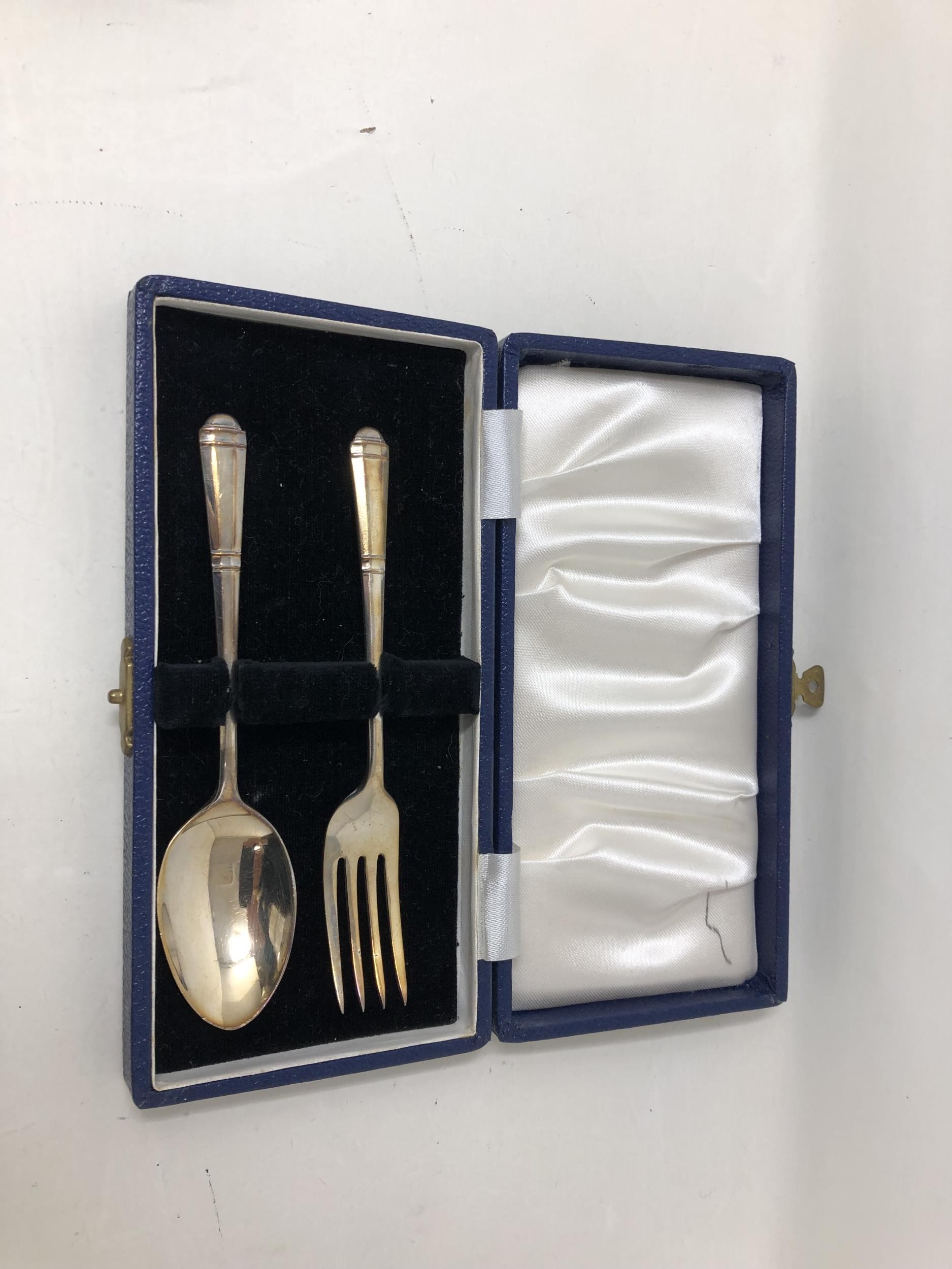 A pair of silver salts, a pepper pot, two napkin rings, a fork and spoon 6.6 ozt, a silver backed - Image 4 of 20