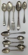 A pair of sterling silver coloured metal spoons, three other silver spoons, 7.4 ozt and four