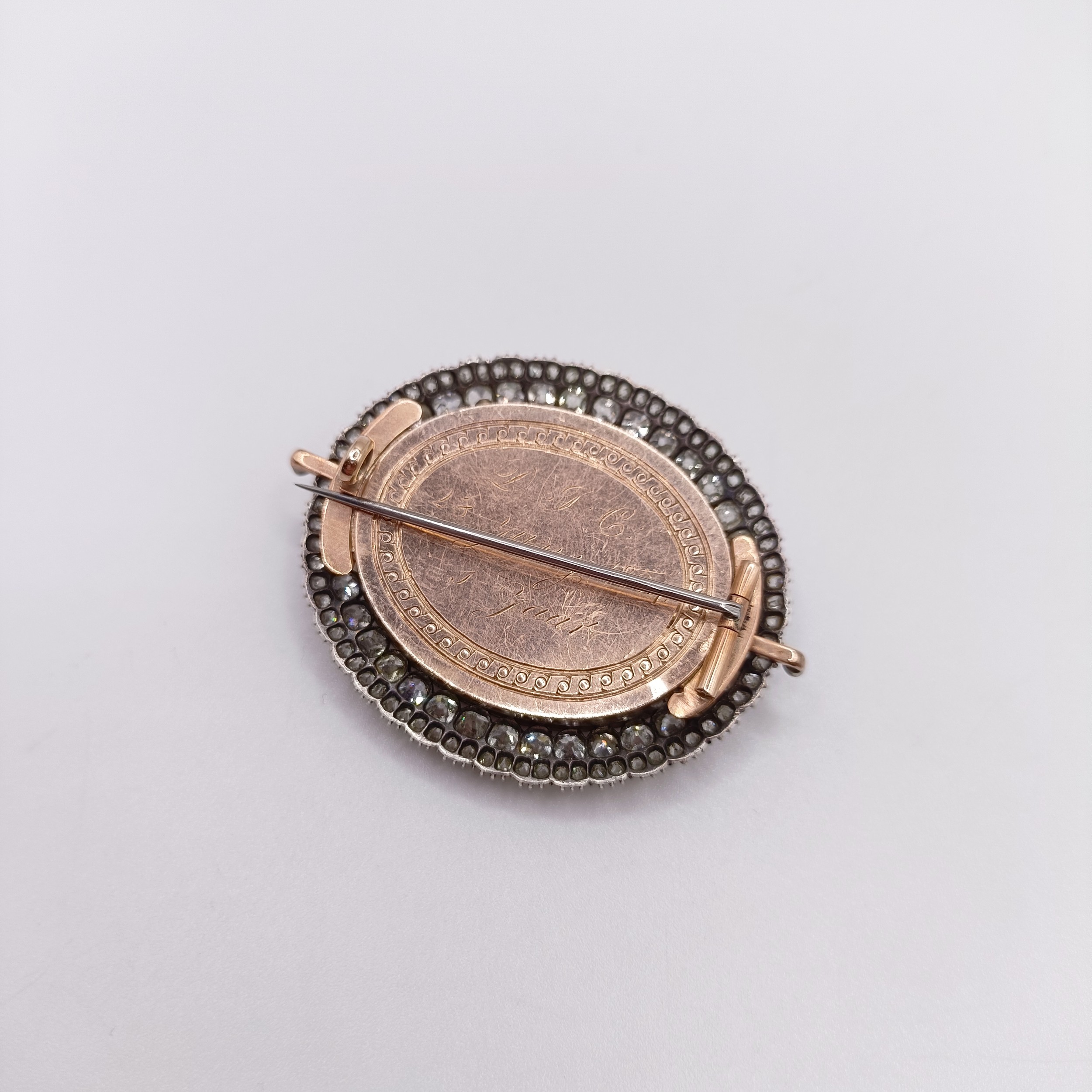 An early 19th French diamond, blue enamel, yellow and white metal oval brooch, decorated a basket of - Image 6 of 6