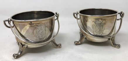 A pair of Continental silver coloured metal salts, in the form of swing handled buckets (2) 5.9 ozt
