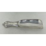 A sterling silver shoe horn, handle filled, 79 g all in