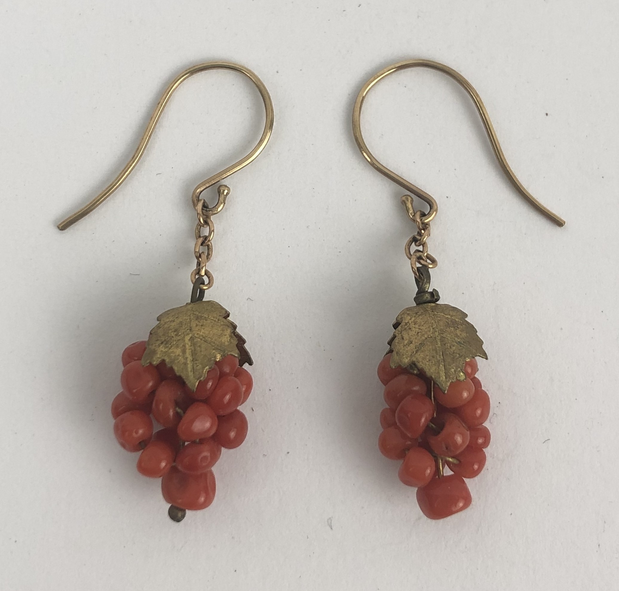 A pair of gilt metal and coral earrings, in the form of a bunch of grapes - Image 2 of 4