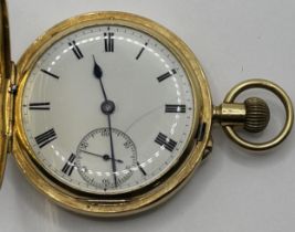 An 18ct gold hunter pocket watch, the enamel dial with Roman numerals, by Samuel Stanley, London