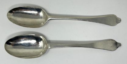 Two matching 18th century silver trefid rat tail spoons, marks rubbed, 1.2 ozt some repairs