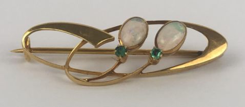 A 9ct gold, opal and green stone brooch