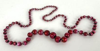 A vintage foil bead necklace