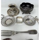 An Indian silver coloured metal sugar bowl, assorted teaspoons, a napkin ring, a pair of pierced