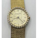 A ladies 18ct gold Vacheron & Constantin wristwatch, with a diamond bezel, all in 60 g