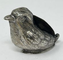 An Edward VII novelty silver pin cushion, in the form of a chick, Birmingham 1906