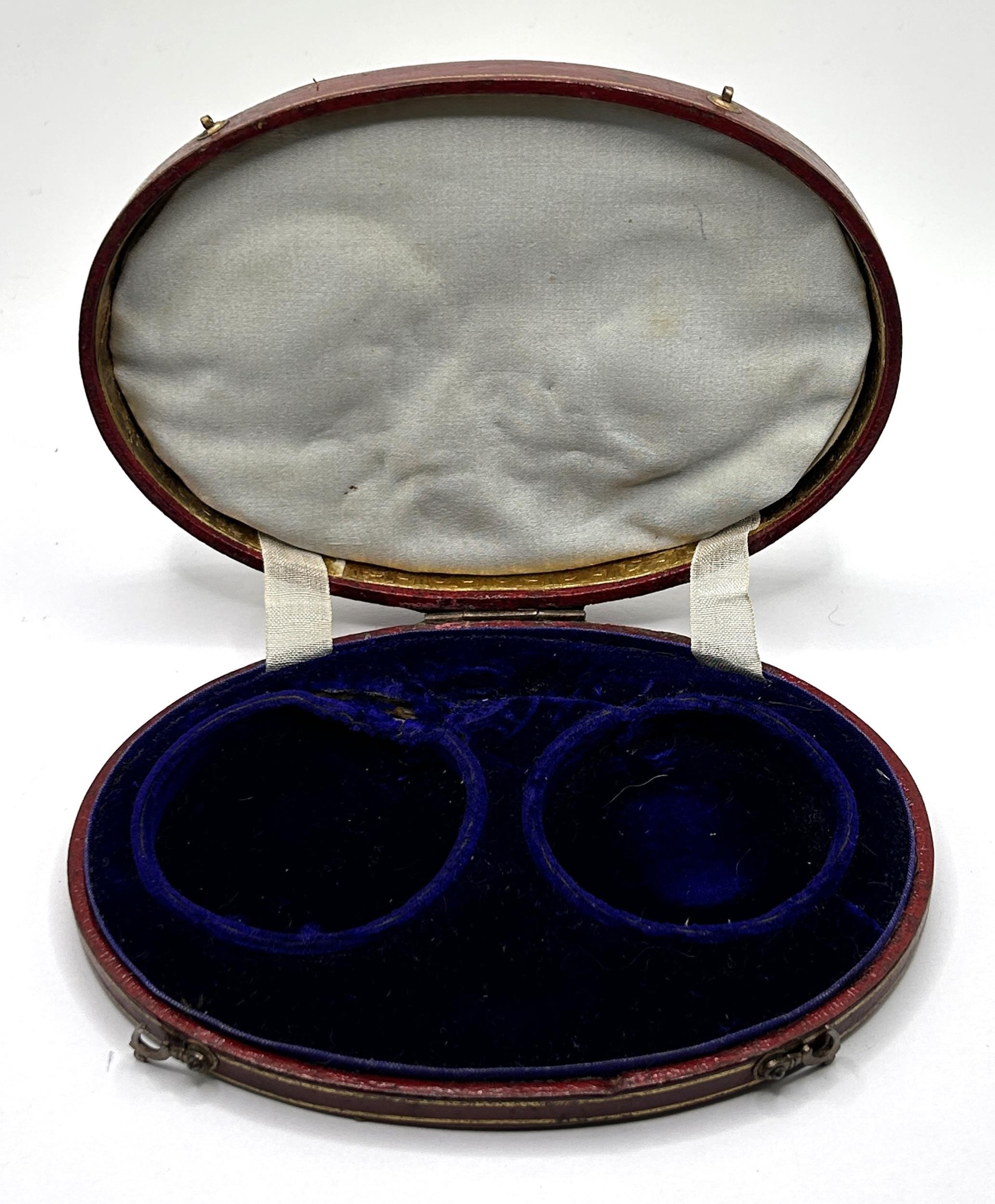 An early/mid 19th century French oval box, to hold two pocket watches, the cover tooled in gilt 'DON - Image 3 of 5